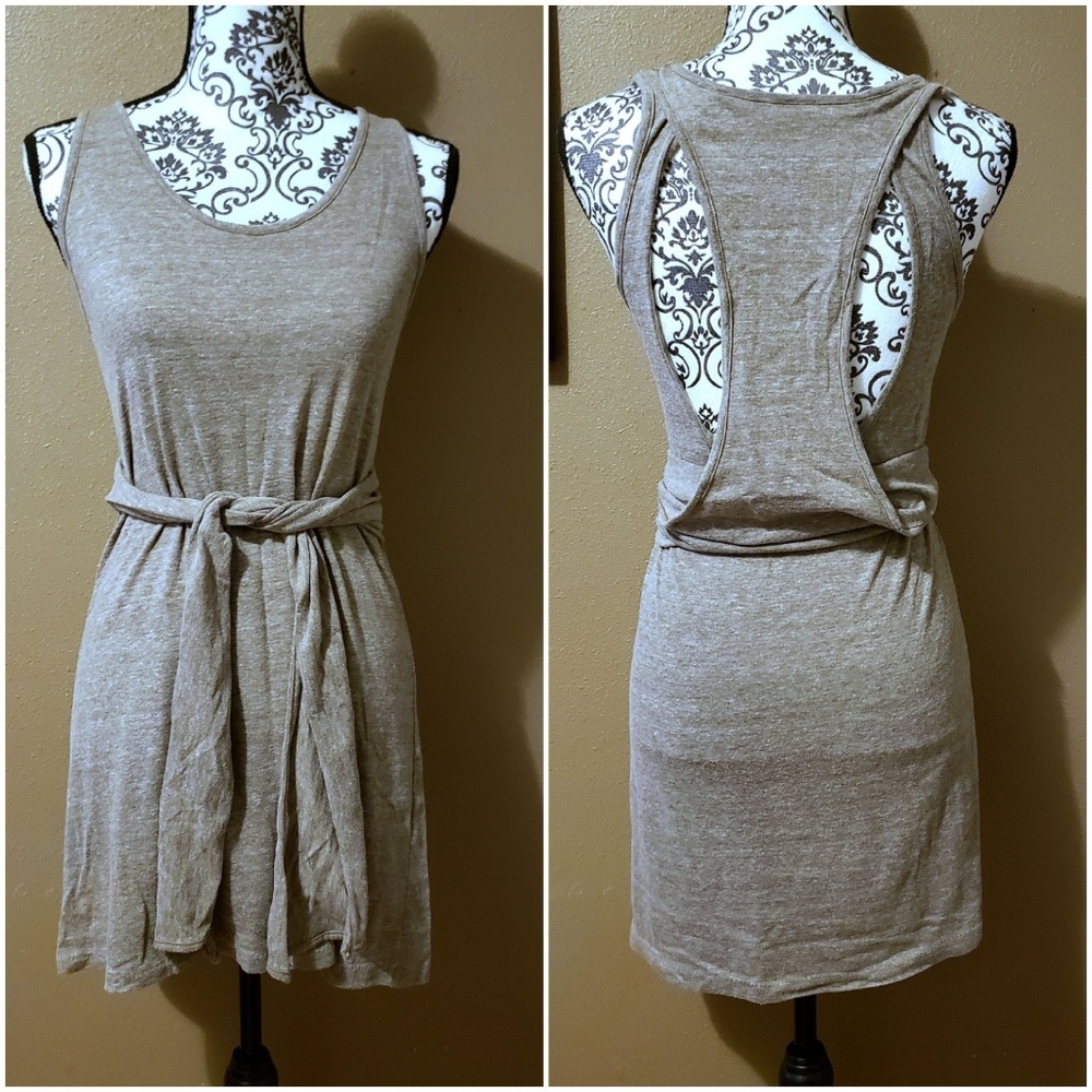 Sleeveless dress with wrap-around tie